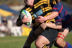 Ross-Wakeham-tackles-Gareth-Brown